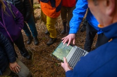 Dave D'Amore shows participants a topographical map of the area.